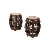 PAIR OF CARVED HUANGHUALI AND BURRWOOD BARREL STOOLS, QING DYNASTY