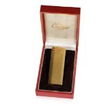 CARTIER: A GOLD PLATED CIGARETTE LIGHTER