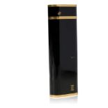 CARTIER: A BLACK LACQUER AND GOLD PLATED CIGARETTE LIGHTER