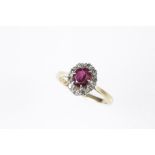 "RUBY" AND DIAMOND CLUSTER RING