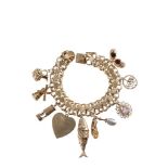 14K YELLOW GOLD CHARM BRACELET