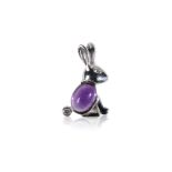 TERSIGNI: AN 18CT WHITE GOLD RABBIT PENDANT