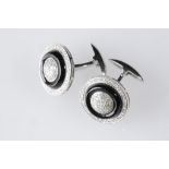 PAIR OF GENTLEMAN'S DIAMOND AND ONYX CUFFLINKS