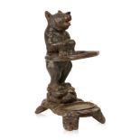 ATTRIBUTED TO THE TRAUFFER FAMILY: A SWISS 'BLACK FOREST' TYPE CARVED WOOD BEAR STICK STAND