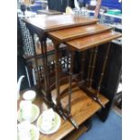 A NEST OF THREE EDWARDIAN MAHOGANY TABLES by 'Warings', largest, 26" high x 18" wide