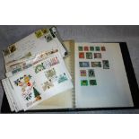 A STAMP ALBUM containing a quantity of world stamps and a collection of First Day Covers