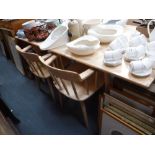 ASET OF SIX 'HAPAFORS' SWEDISH PALE BEECH STICK BACK KITCHEN ARMCHAIRS and a matching table