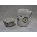 A CHINESE EXPORT PORCELAIN TANKARD and a famille rose armorial tea bowl