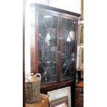 A GEORGE III STYLE MAHOGANY CORNER CABINET with astragal glazed doors, 94" high x 43" wide and three