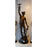 A BRONZED SPELTER CLASSICAL FIGURE OF MERCURY with winged helmet and ankles, holding his Caduceus