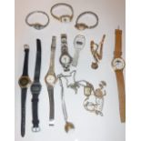 TWO LADIES YELLOW GOLD WRISTWATCHES and a selection of other ladies wristwatches