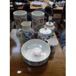 A COLLECTION OF TRADITIONALLY PAINTED POOLE POTTERY to include a pair of vases 9" high