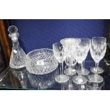 A CUT-GLASS FRUIT BOWL and a set of six wine glasses and other glassware