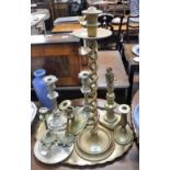 A PAIR OF SILVER PLATED CANDLESTICKS, a large spiral brass candlestick and similar metalware