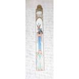 AN EARLY 20TH CENTURY PERFUME BOTTLE of elongated rectangular form, with painted and gilt Egyptian