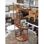 A MAHOGANY MINIATURE SPIRAL STAIRCASE, 42" high