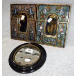 A PUB TYPE MIRROR with seven roundels in an ebonised frame and two Peruvian framed mirrors