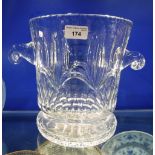 A LARGE CLEAR CUT GLASS TWIN HANDLED ICE BUCKET