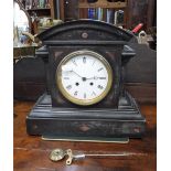 A VICTORIAN SLATE CASED MANTEL CLOCK (pendulum and key in office)