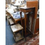 AN ONYX OCCASIONAL TABLE of square form with brass reeded supports, an oak stool fitted a lid and an