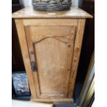 A VICTORIAN STRIPPED PINE POT CUPBOARD