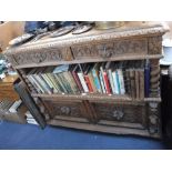 A VICTORIAN CARVED OAK BUFFET with spiral supports and animal mask handles, 42" high x 48" wide