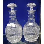 A PAIR OF REGENCY STYLE MALLET-SHAPED DECANTERS AND STOPPERS