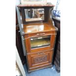 A VICTORIAN WALNUT SHEET MUSIC CABINET with mirror back and brass gallery, 45" high x 20" wide