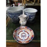 AN ORIENTAL IMARI BOWL, 12" dia. An Oriental blue and white jardiniere on a carved stand, another