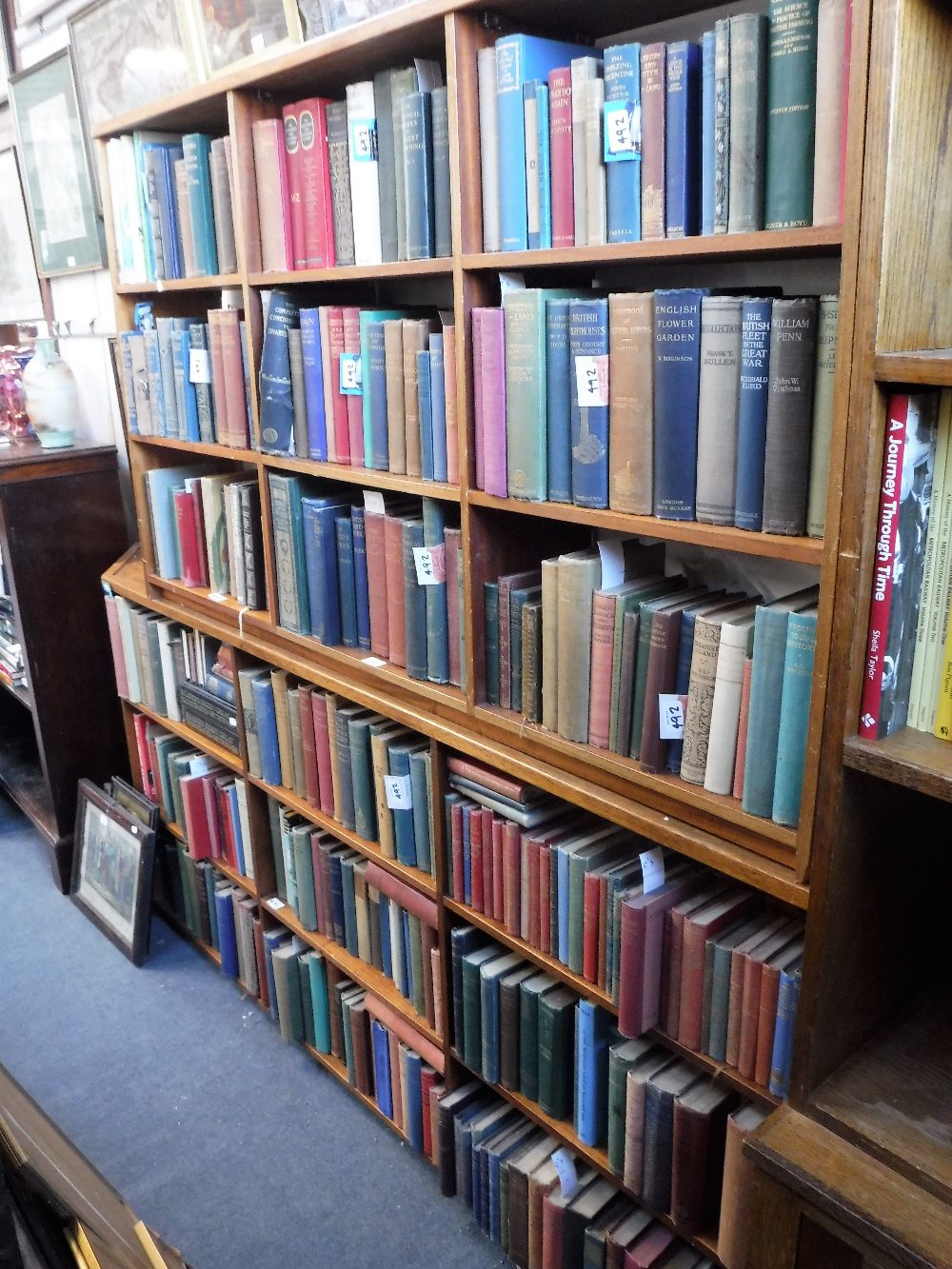 A LARGE COLLECTION OF BOOKS (contents of bookcase)