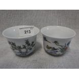 A PAIR OF CHINESE PORCELAIN SAKI CUPS with six character marks and decorated bodies