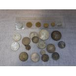A COLLECTION OF WORLD COINS including France, Netherlands, India and other countries and a