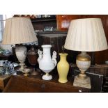 A CONTINENTAL GLAZED AND BISQUE PORCELAIN VASE, table lamps, a copper trophy cup and a Grand Tour