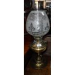 A VICTORIAN BRASS OIL LAMP with acid etched shade (cracked and glass chimney), overall, 22" high