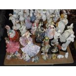A COLLECTION OF RESIN LADIES including the Leonardo Collection and a selection of framed and