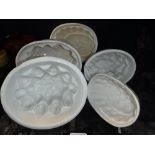 FIVE VARIOUS WHITE GLAZED POTTERY JELLY MOULDS, 19th century (5)