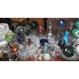 A COLLECTION OF GLASSWARE including decanters, vases and other coloured glassware