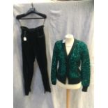 YVES ST LAURENT: A GREEN KNITTED CARDIGAN decorated throughout with green sequins and a pair of