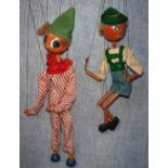 PELHAM PUPPETS; A TYPE LS "CLOWN" in a cream and red striped trouser suit, in good original