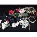 A COLLECTION OF VINTAGE DRESS TRIMS including a sequinned and feathered face mask