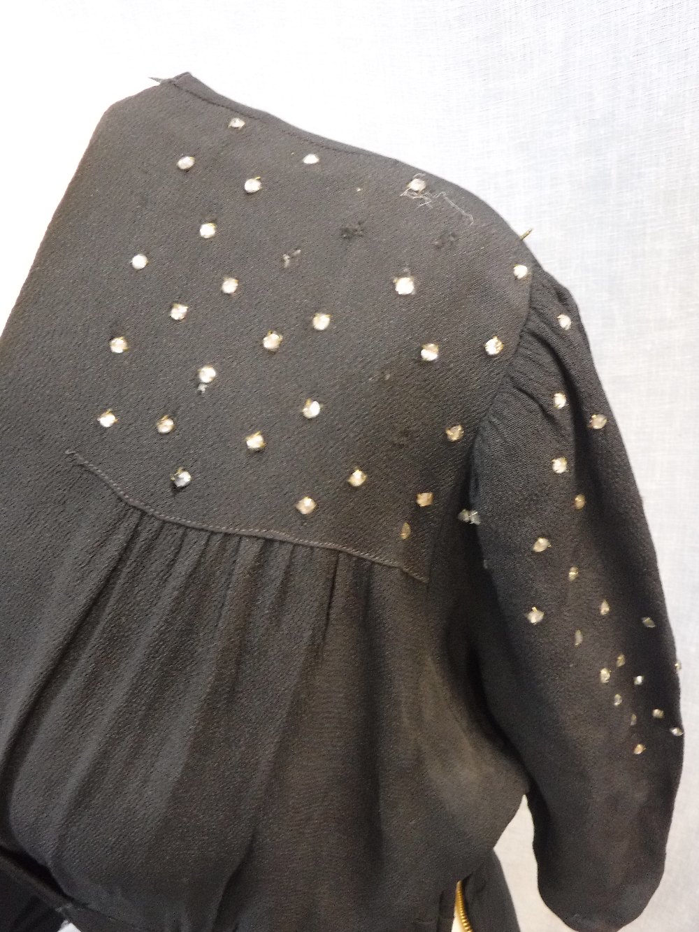 A FULL LENGTH BLACK CREPE EVENING DRESS, the shoulders and sleeves decorated with clear beadwork, - Image 4 of 4