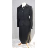 A USA 1940'S CHARCOAL GREY TWO PIECE SUIT, UK modern size 10,the jacket with button front and fitted