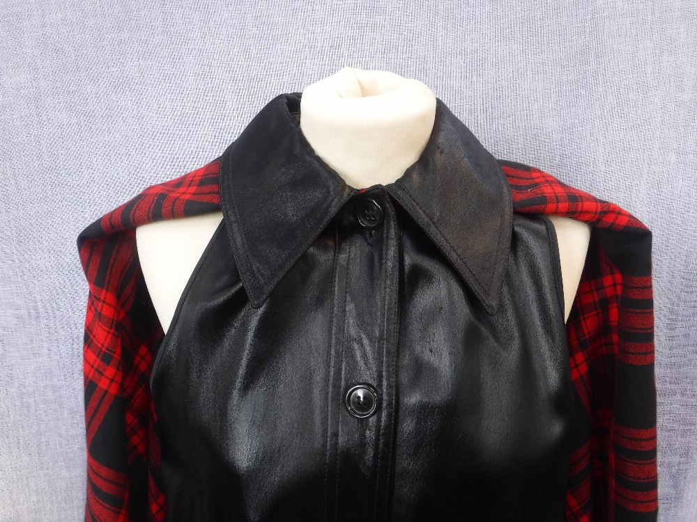 ST LAURENT: A FRENCH BLACK COAT/CAPE edged with red braid and red tartan lining - Image 3 of 4