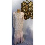 FRANK USHER, LONDON: A RAYON TULLE FULL LENGTH EVENING DRESS with full length sleeves decorated