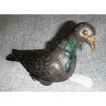 V.B. & CIE a PARIS; AN EARLY 20TH CENTURY TINPLATE CLOCKWORK PIGEON with working mechanism, 8" long