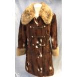 REVILLE OF LONDON, A VINTAGE COW HIDE FUR COAT, with collar & cuff fur trim, circa 1970's