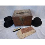 A LEATHER TOP HAT BOX, the interior pink satin lining with 'Army, Navy Cooperative Society' label,