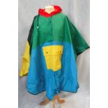 MARY QUANT: A green, yellow, blue and red poncho raincoat with original carrying pouch