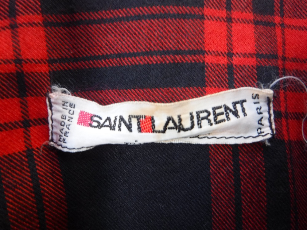 ST LAURENT: A FRENCH BLACK COAT/CAPE edged with red braid and red tartan lining - Image 2 of 4