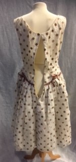 A CREAM AND LIGHT BROWN SPOTTED FLOCK NYLON PARTY DRESS, the waistline with brown satin trim, - Image 2 of 2